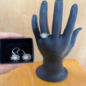 Conjunto de prata em formato de flor